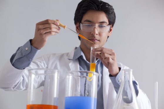 A Level Chemistry student doing an experiment