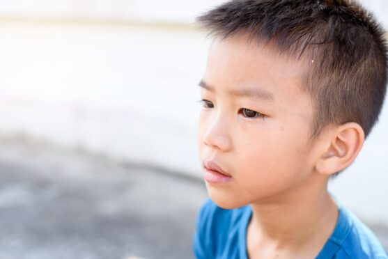 boy with school phobia homeschooling in Thailand